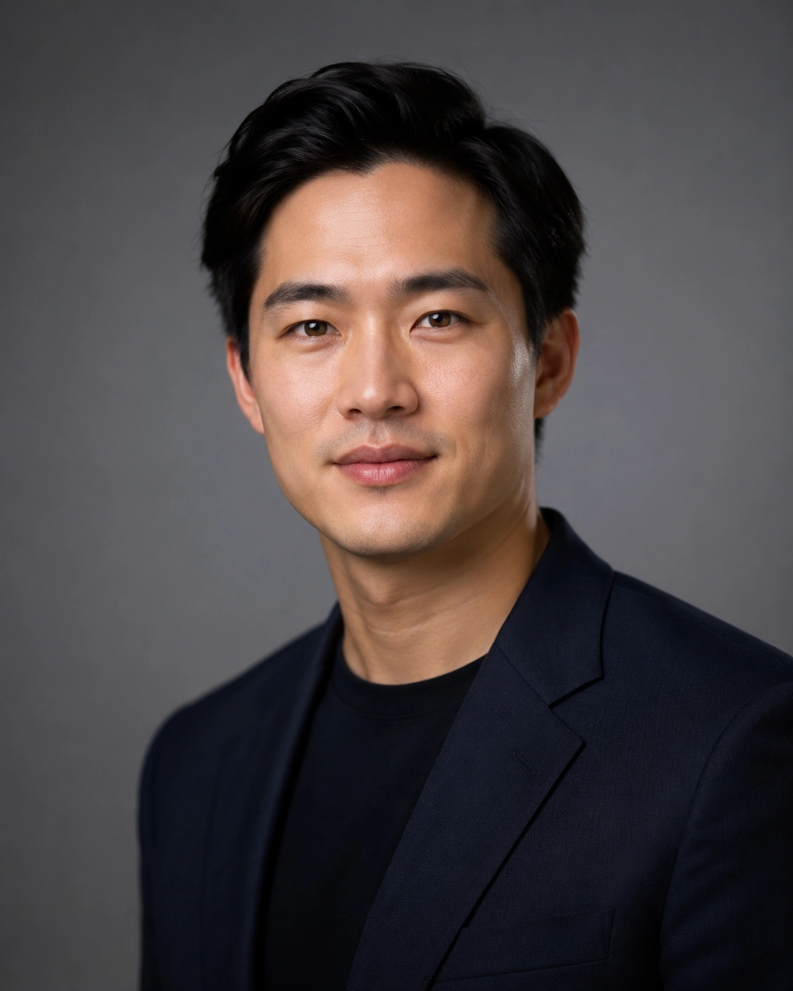 Professional founder headshot with soft studio light.